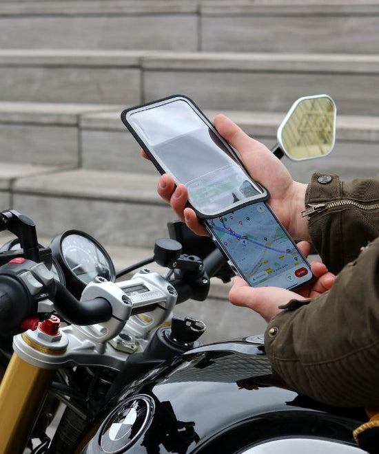 A young rider on the road in the city, focused on their first motorcycle trips.